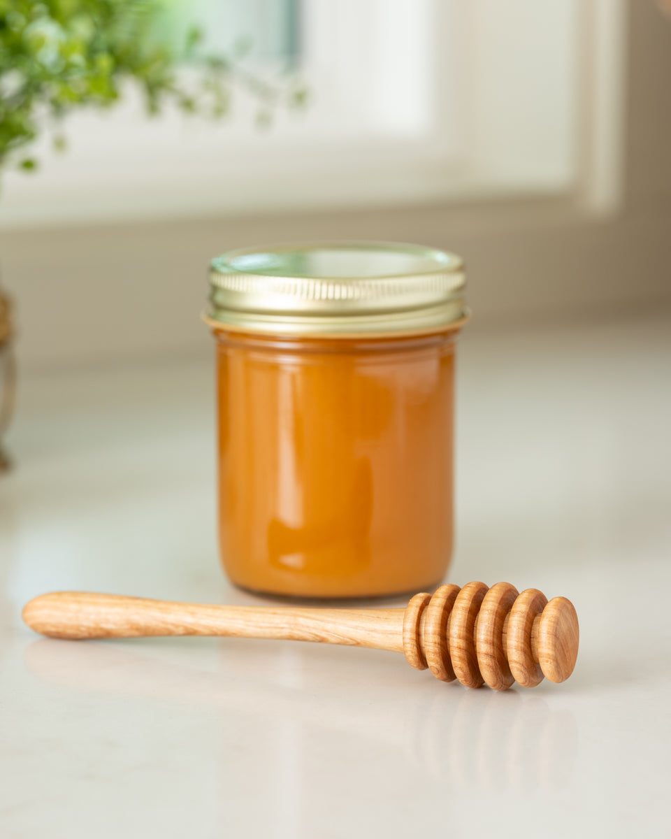 Mestolo per miele in legno d'ulivo