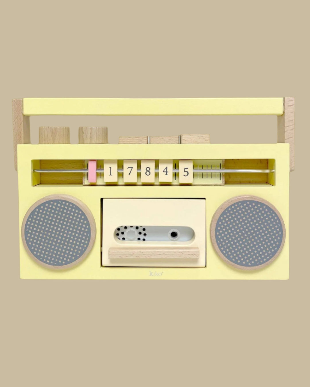 Toy radio with wooden dials and buttons on a white background