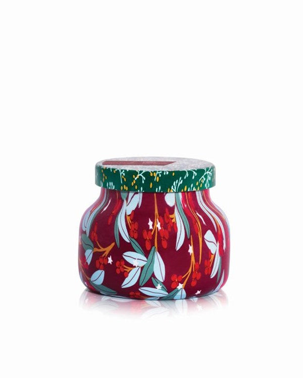 Decorative jar with floral design on a white background